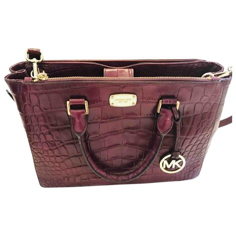 michael kors small burgundy bag|Michael Kors maroon handbags.